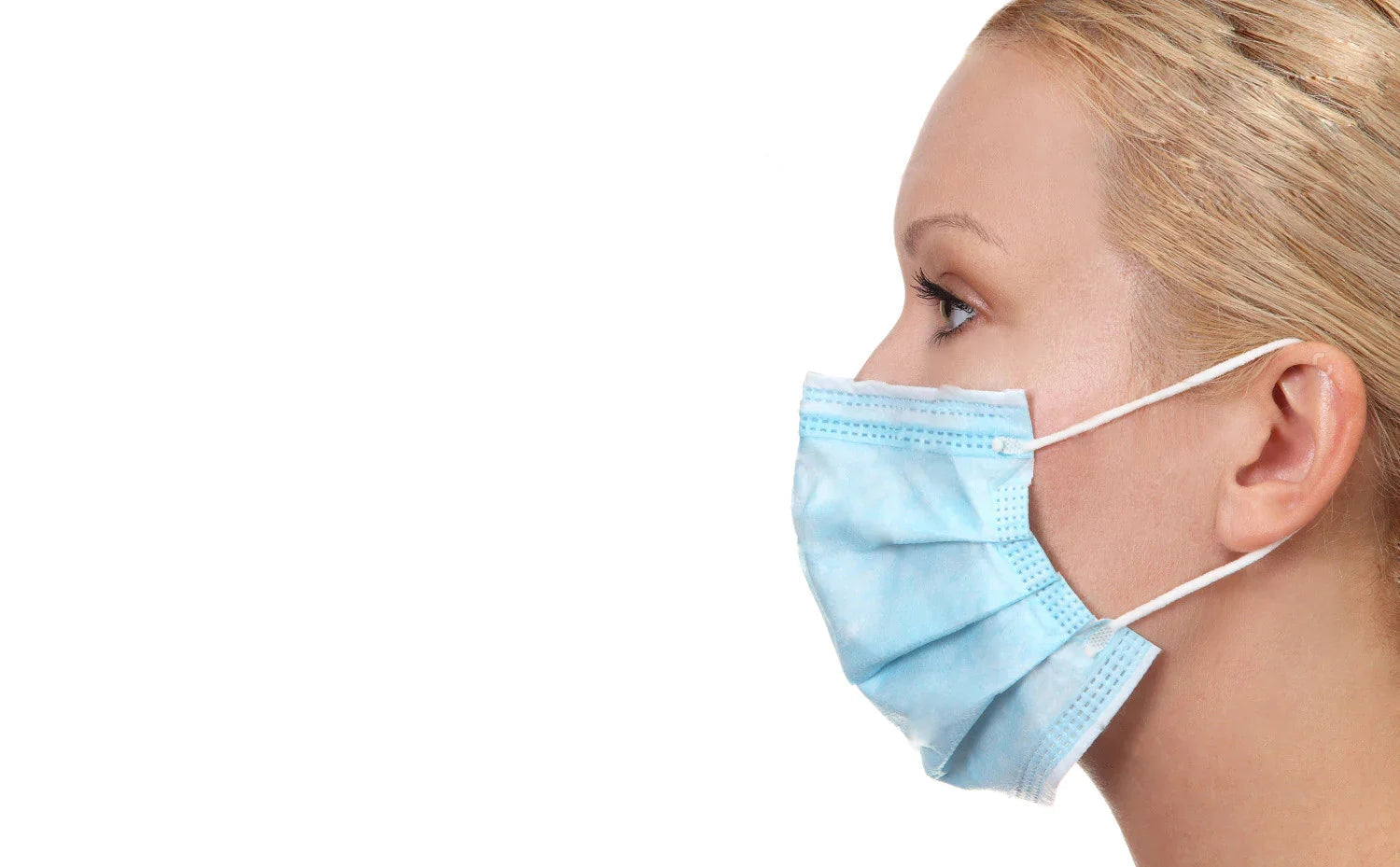 Woman wearing blue hypoallergenic face mask, Cottonique allergy-free apparel, white background
