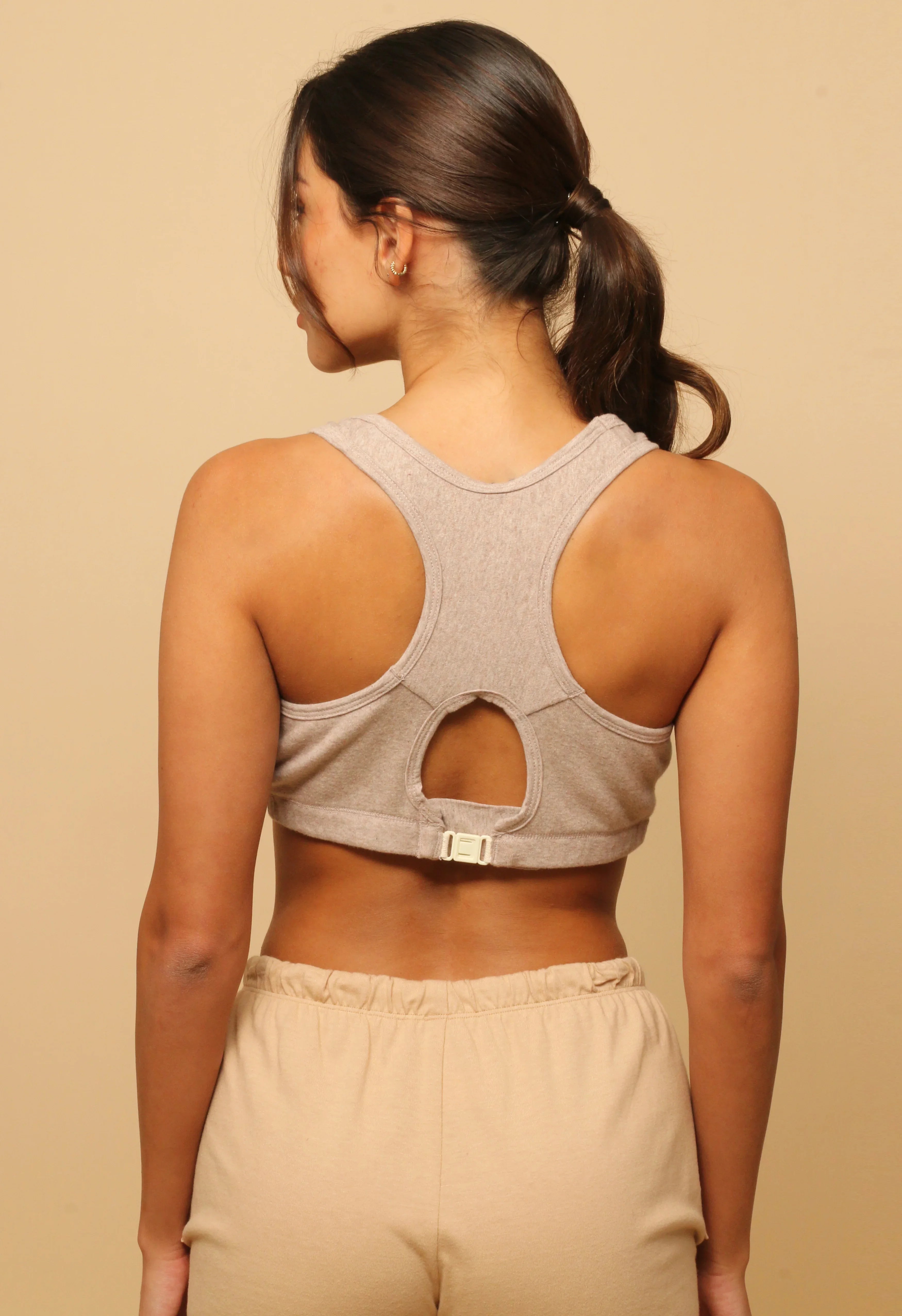 Woman wearing allergy-free cotton racerback bra from Cottonique, back view