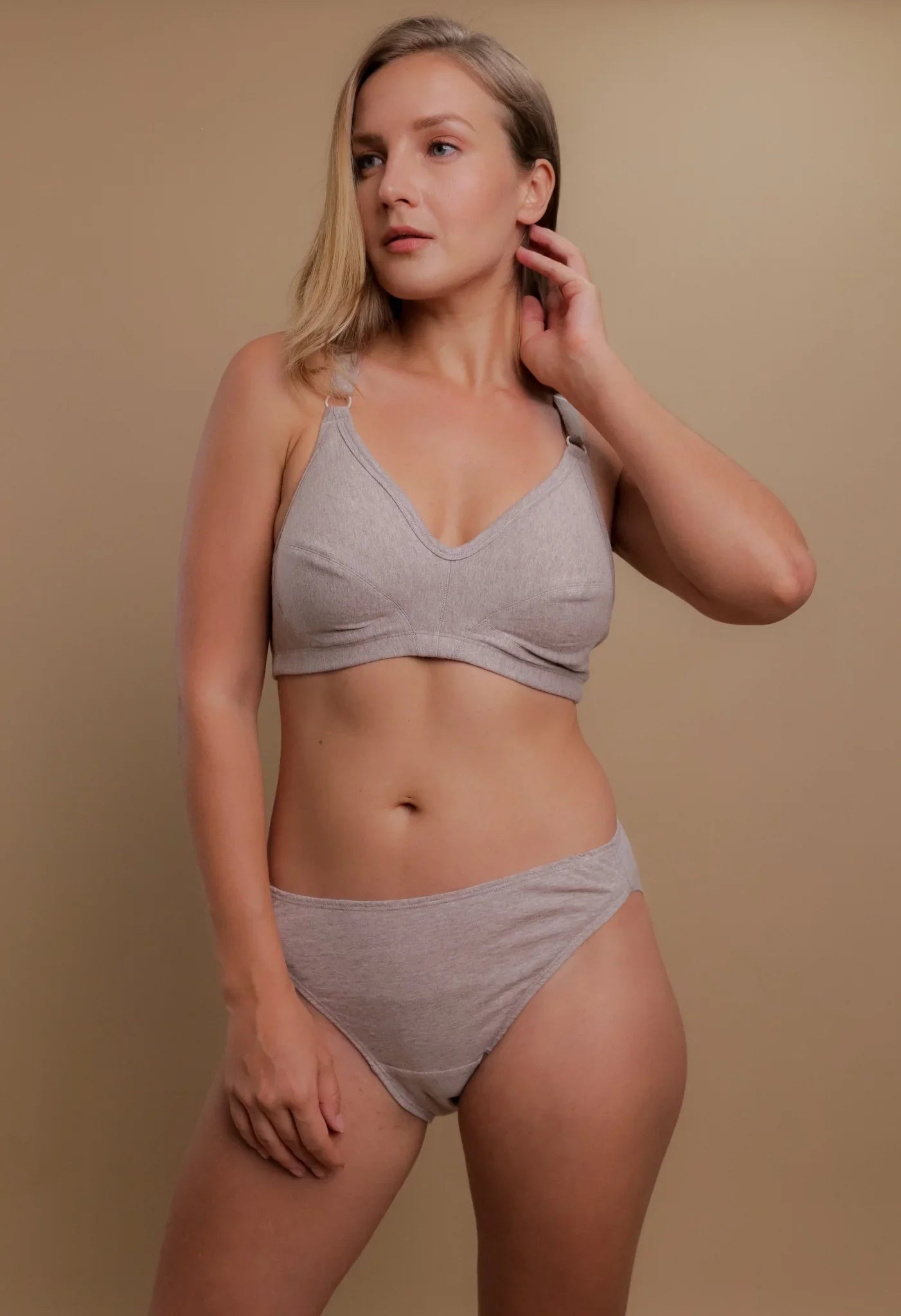 Woman modeling Cottonique allergy-free hypoallergenic bra and underwear set in beige